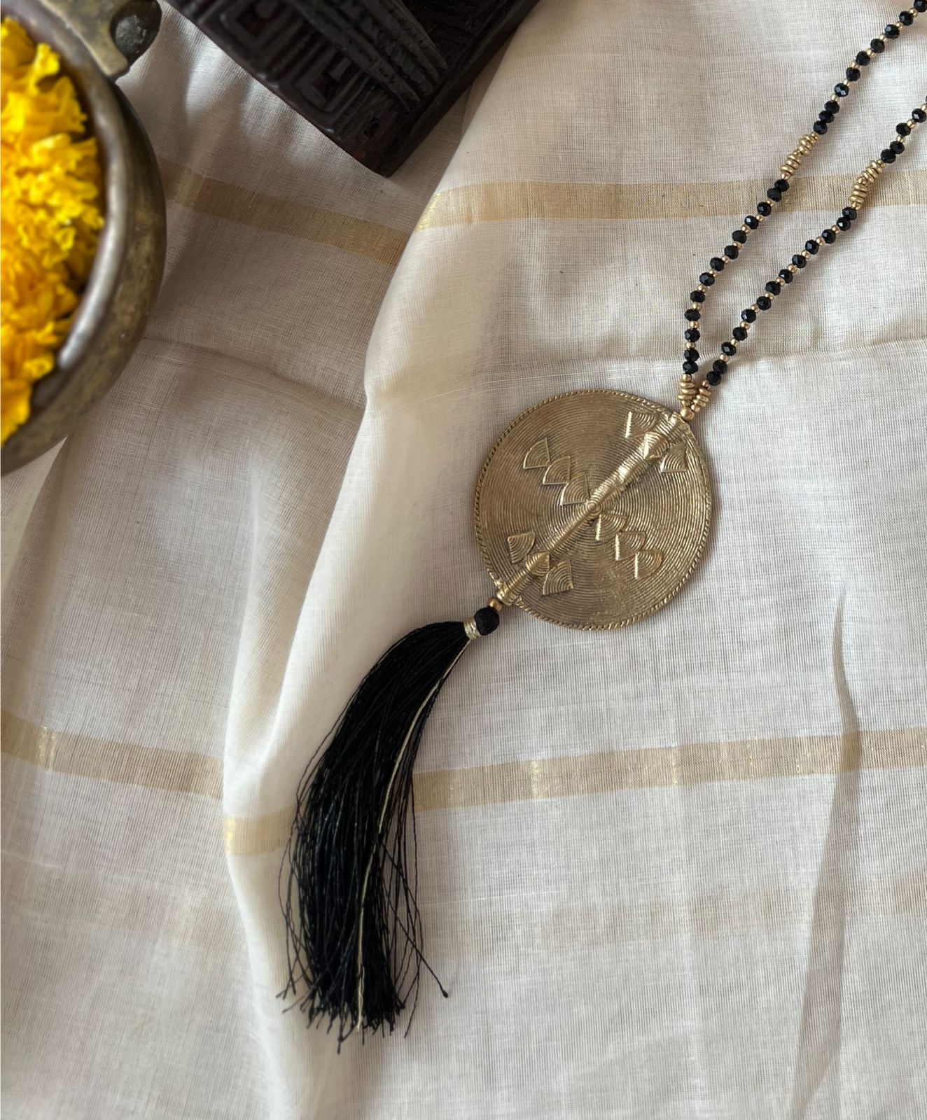 BLACK LONG NECK PIECE WITH TASSEL