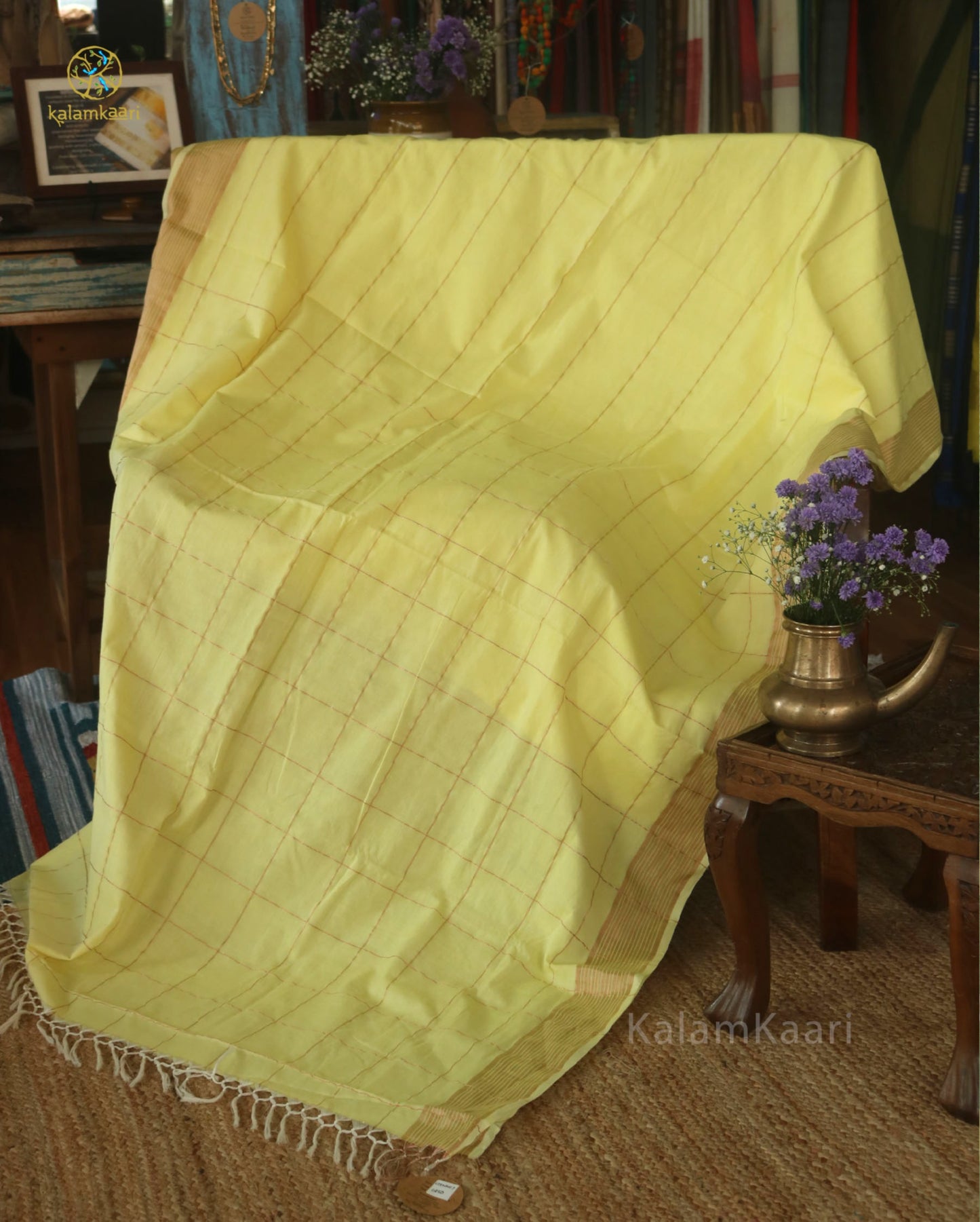 Lemon yellow colored Kasavu saree