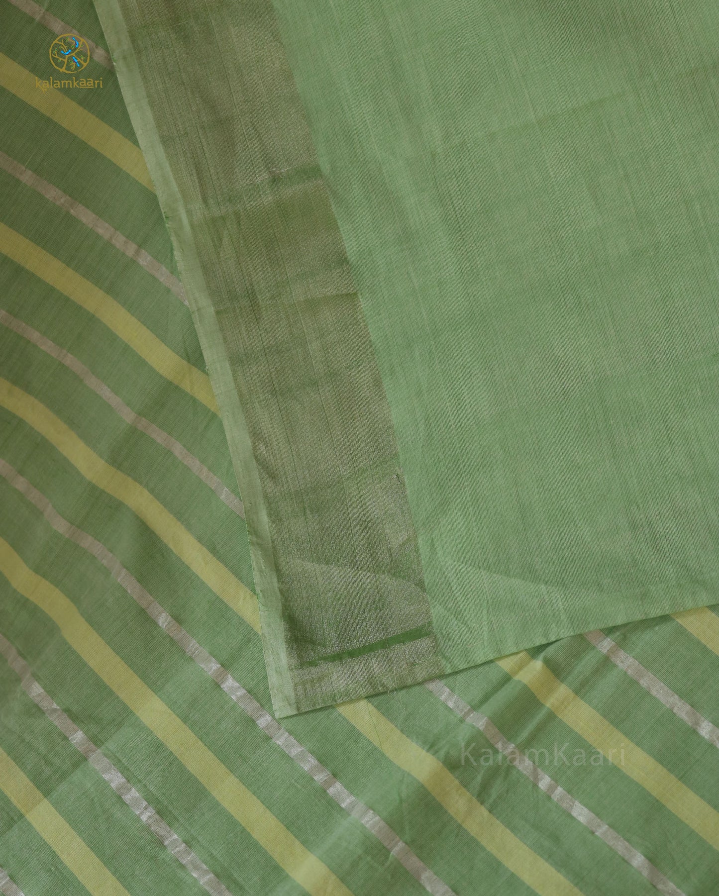 Lime green colored Kasavu saree
