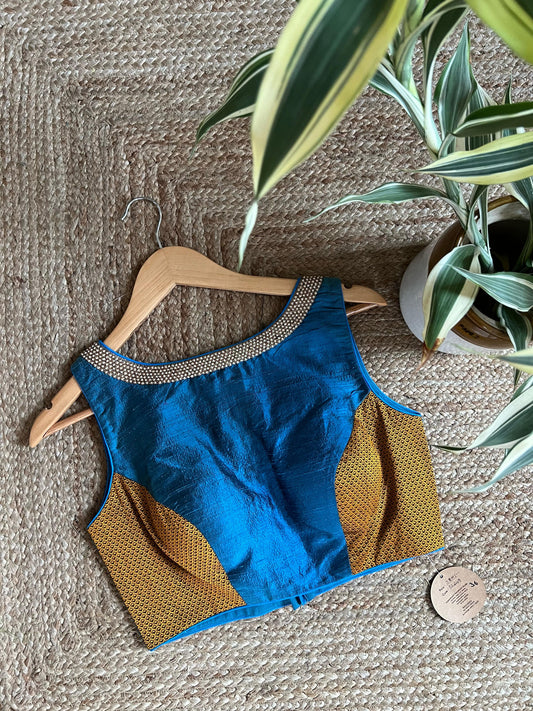 Raw silk blouse with pearl embroidery