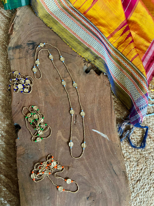LONG BEADED NECKLACE WITH COIN PENDENT