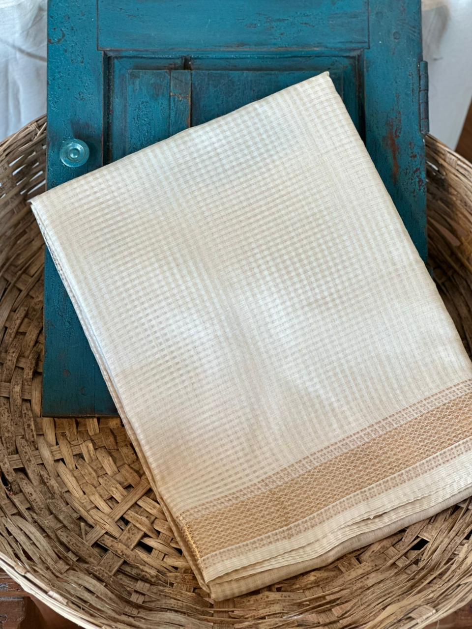 TUSSAR SAREE WITH MISSING CHECKS AND ZARI BORDER