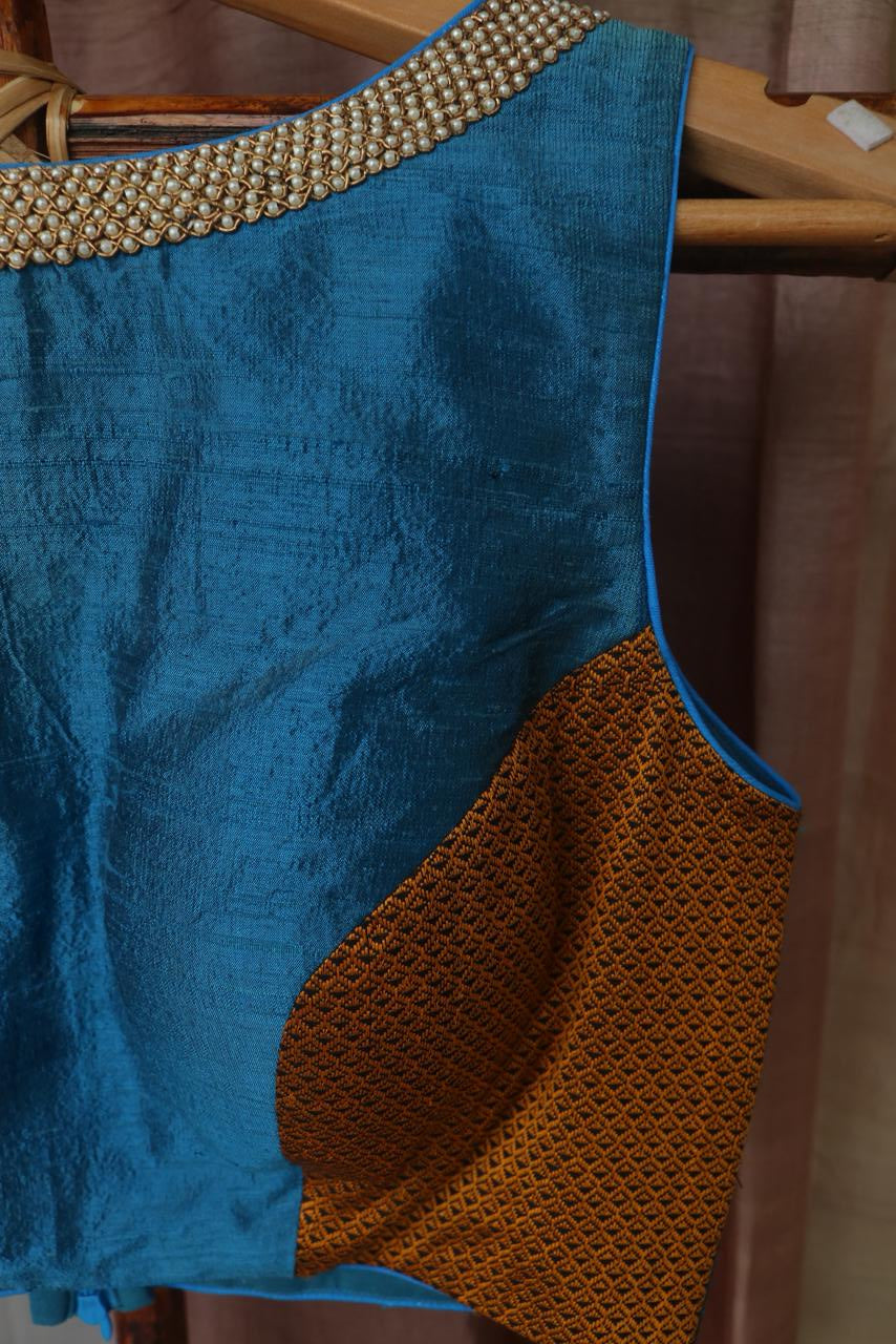 Raw silk blouse with pearl embroidery