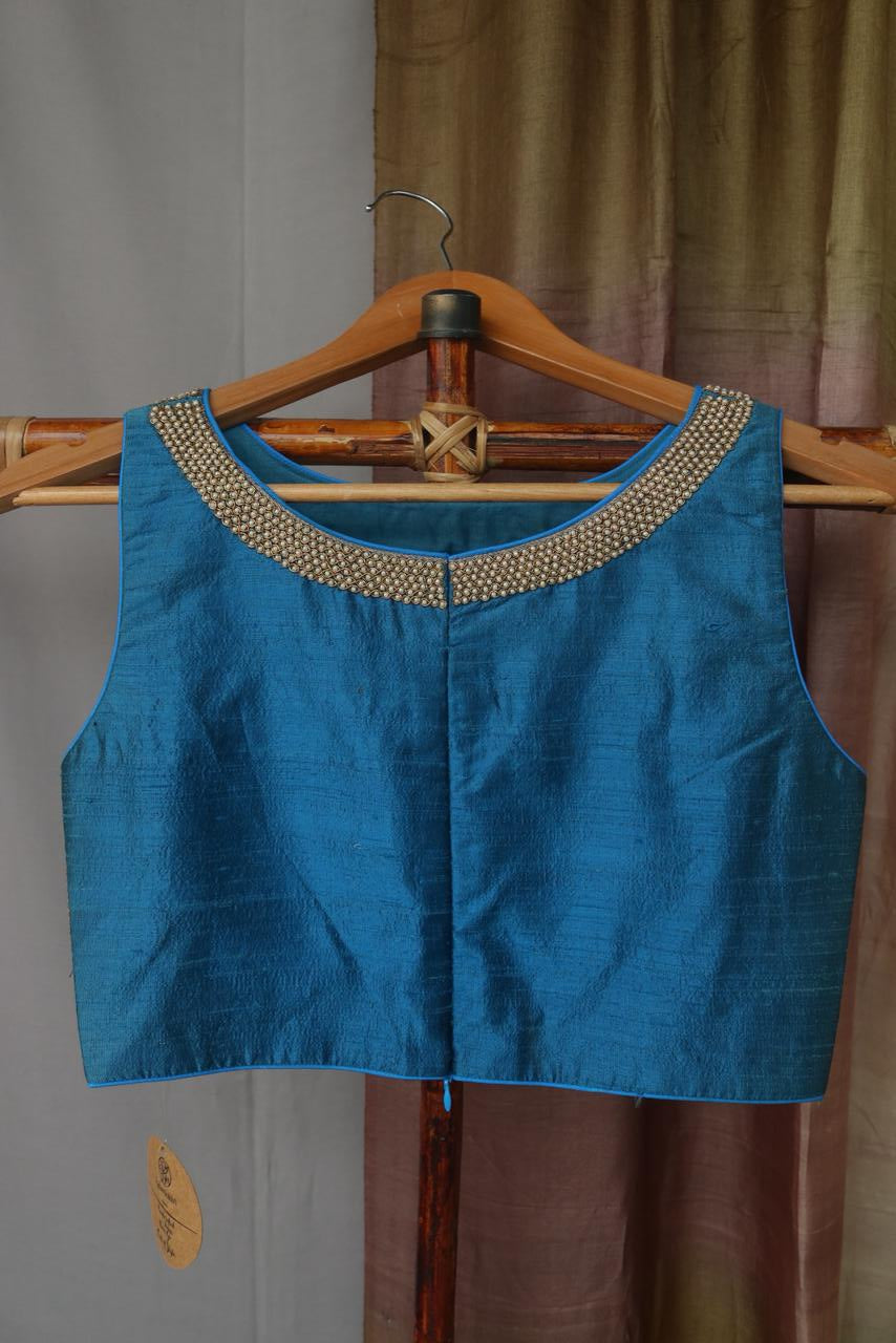 Raw silk blouse with pearl embroidery